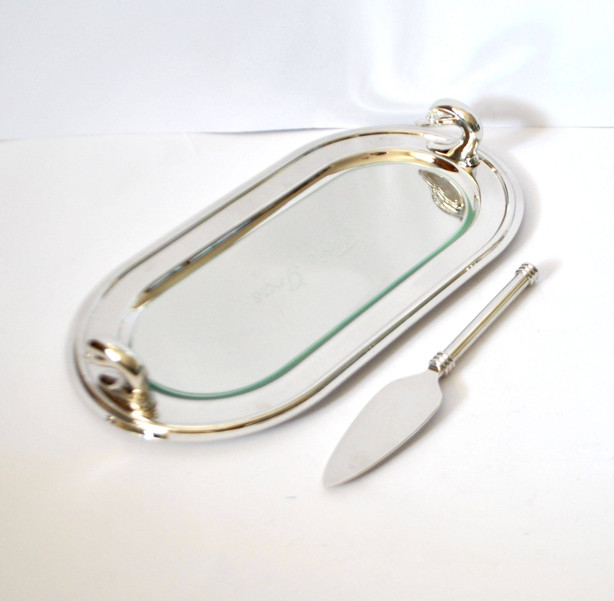 Vintage silver-plated foie gras platter with goose head decoration and serving spatula.