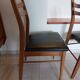 5 Scandinavian style chairs, wood and black faux leather.