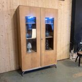 Glass-fronted school cabinet in raw oak