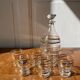 Gold-rimmed decanter and liqueur glass service