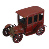 Vintage tin car with pull lever