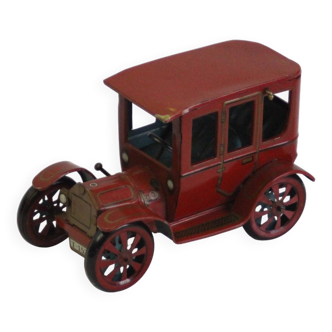 Vintage tin car with pull lever