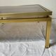 Glass and brass coffee table