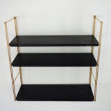 Modular wall shelf in twisted brass
