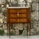 Charming small chest of drawers in precious wood marquetry.