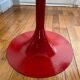 Pair of low tulip stools in red metal 1970