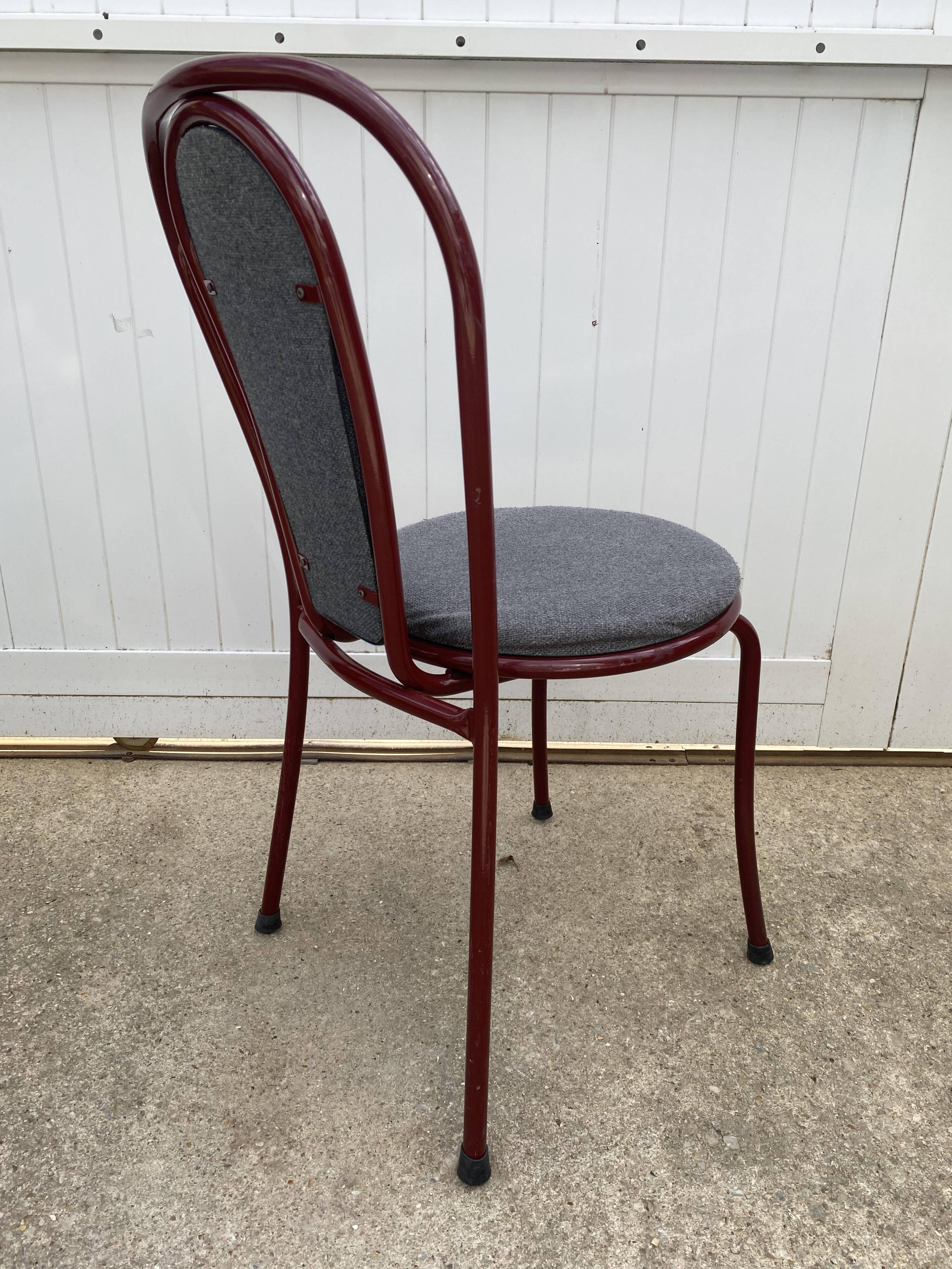 Metallic burgundy bistro chair for restaurants and communities with gray fabric