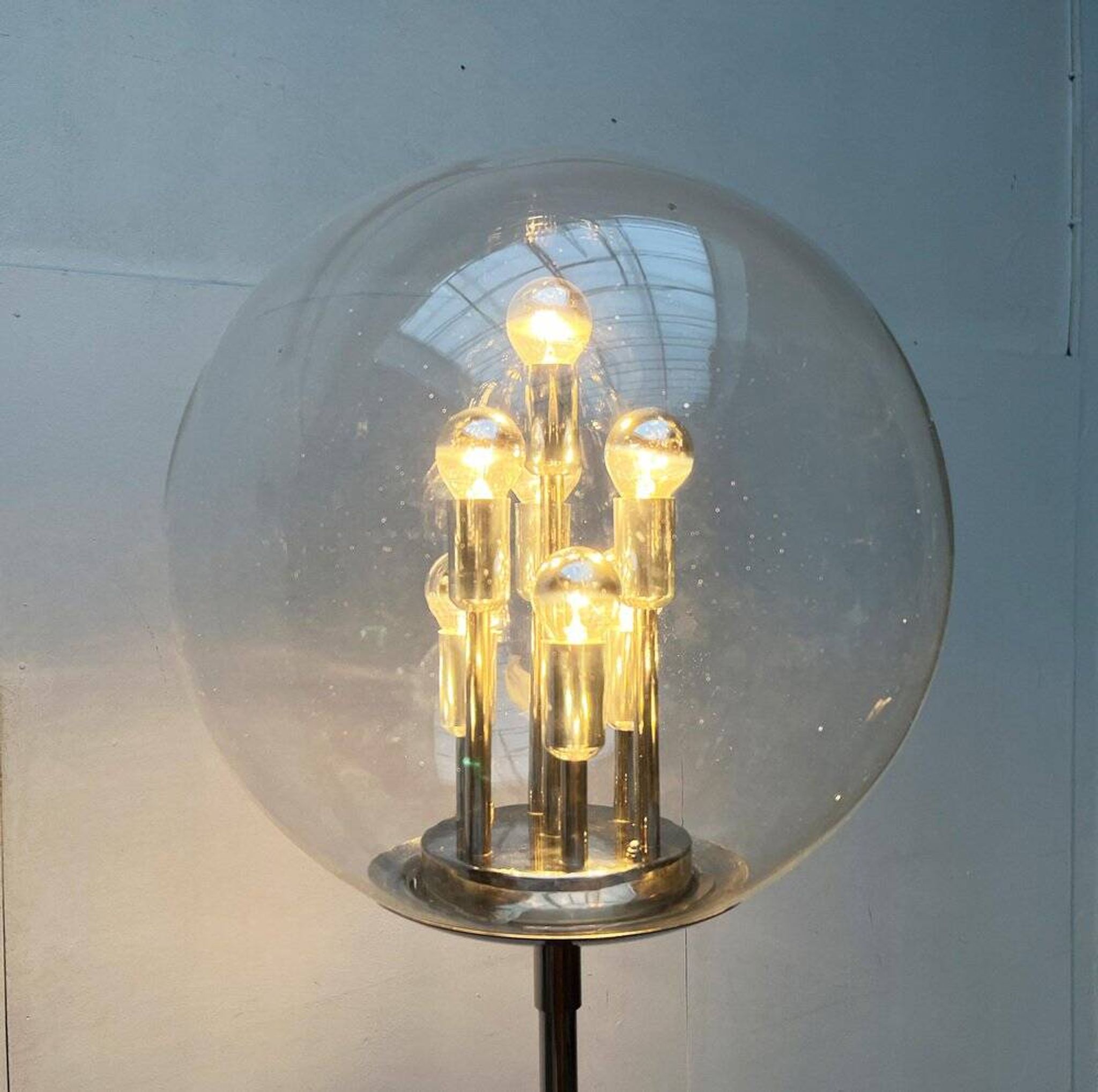 Spherical chrome and glass planetary floor lamp from the mid-century German space age by Doria Leuchten, 1960s.