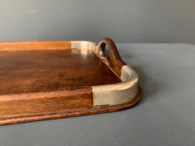 Old tray in wood and brass