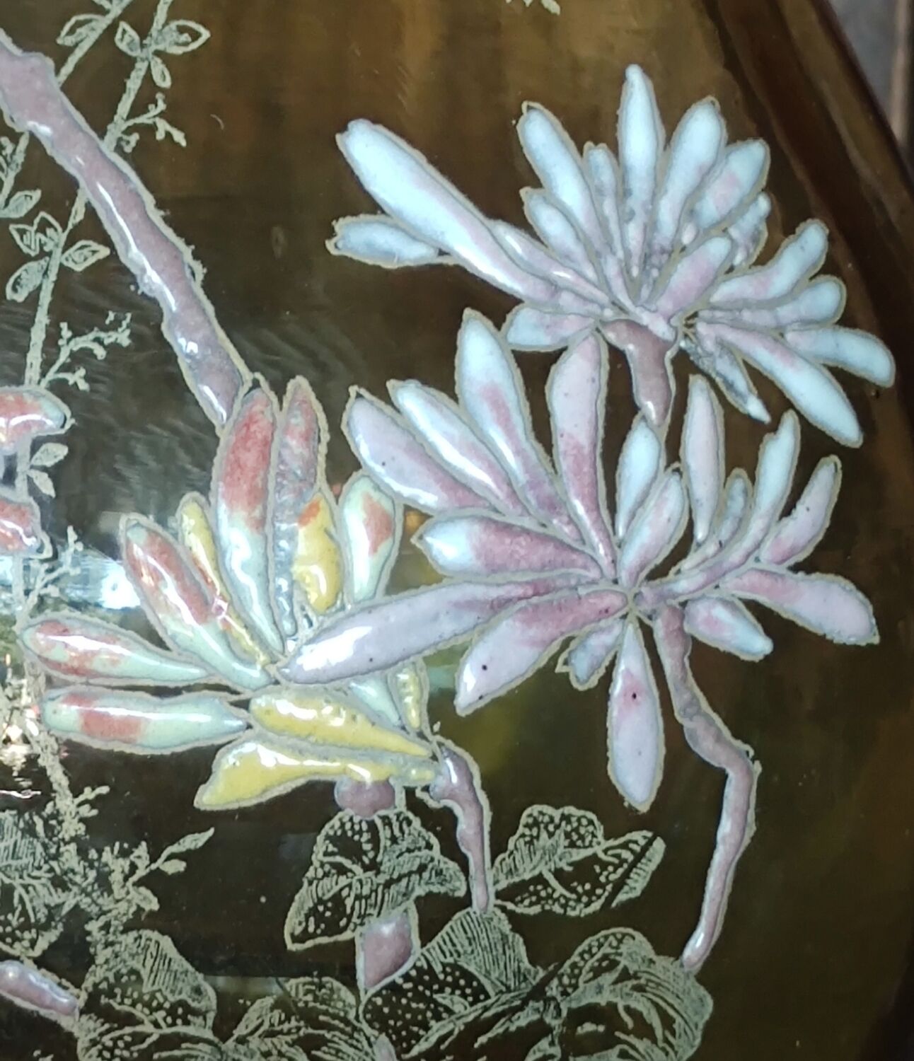 Old vase with enamelled floral decoration