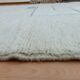 Handmade natural wool rug, size 150 x 250 cm