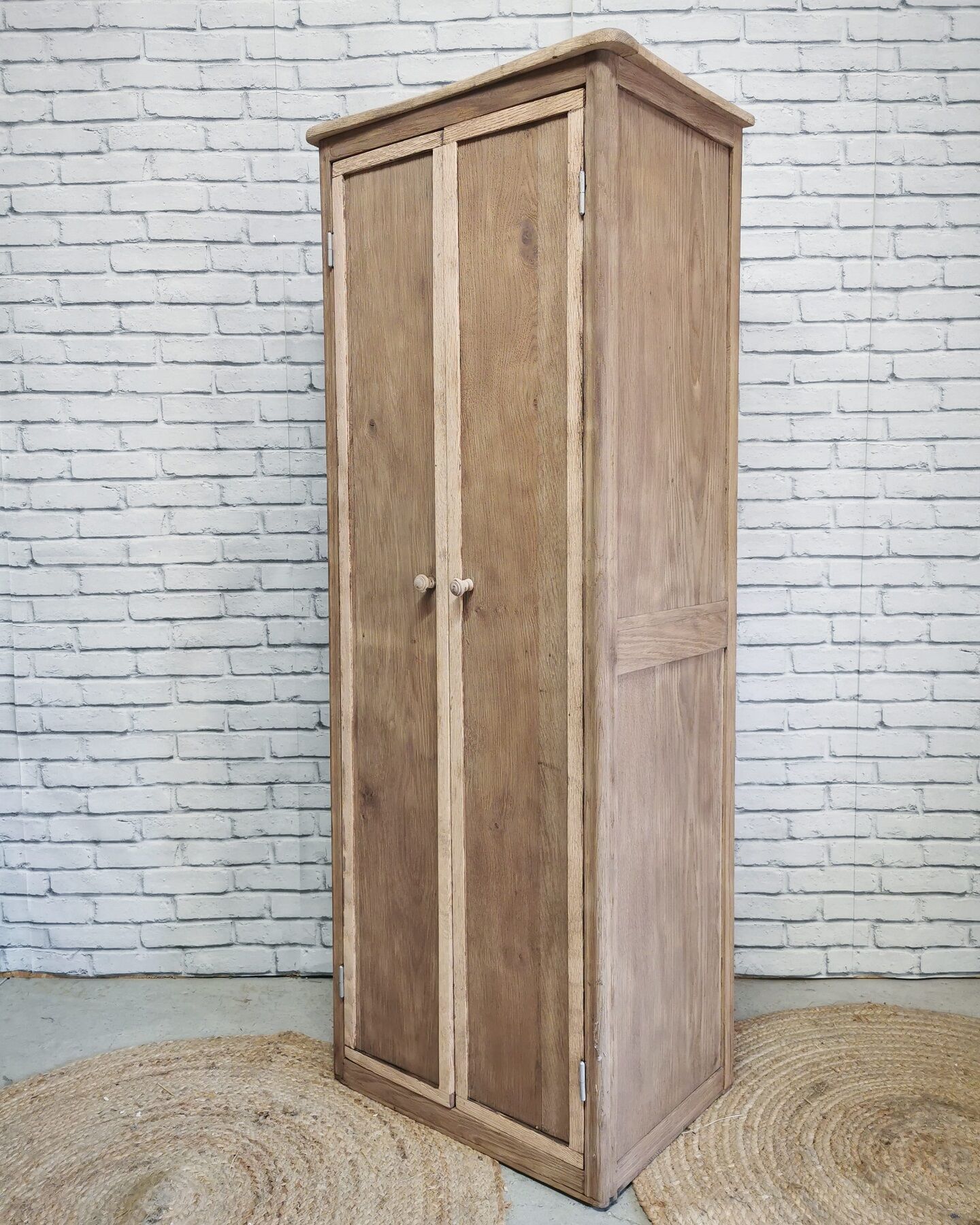 Narrow raw wooden cabinet
