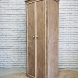 Narrow raw wooden cabinet