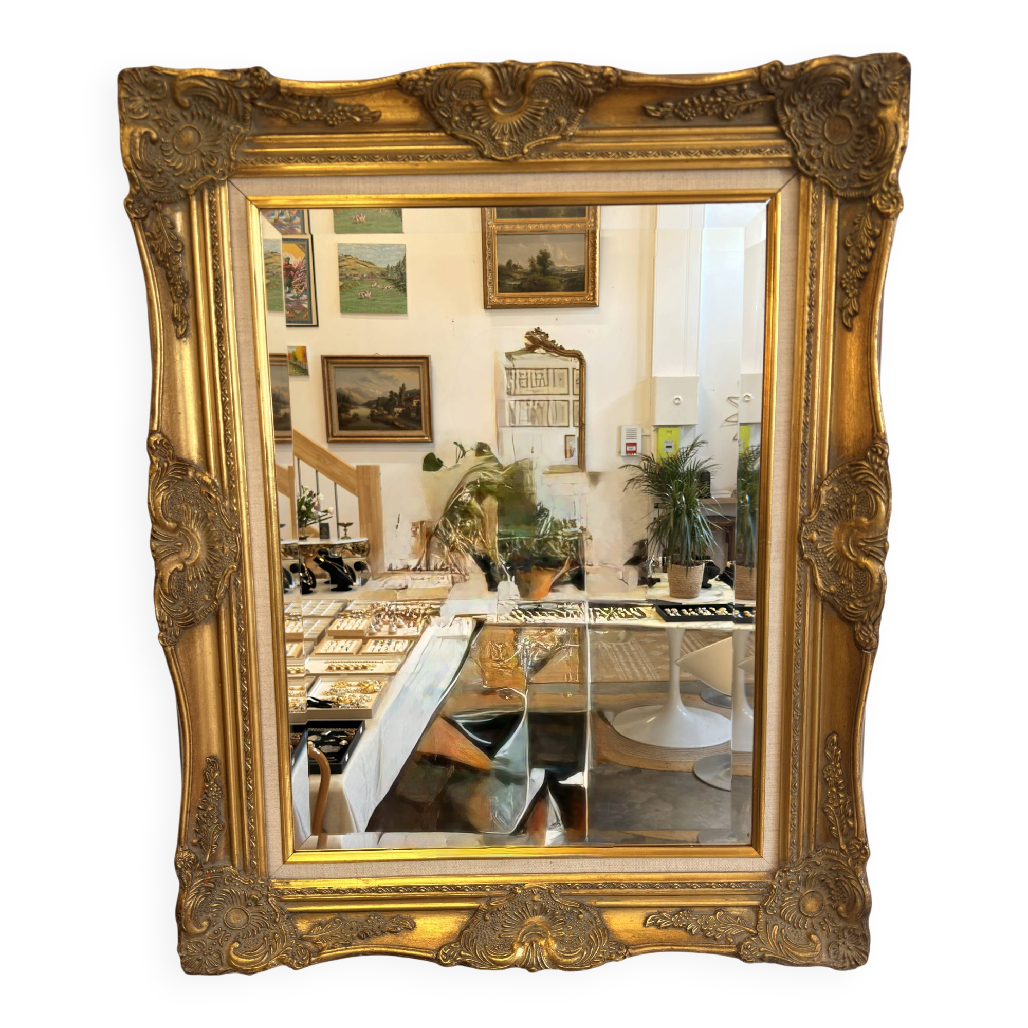 Golden wooden mirror in Louis XV style