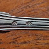 Christofle - Set of 7 dessert forks in the violoné palmette pattern.