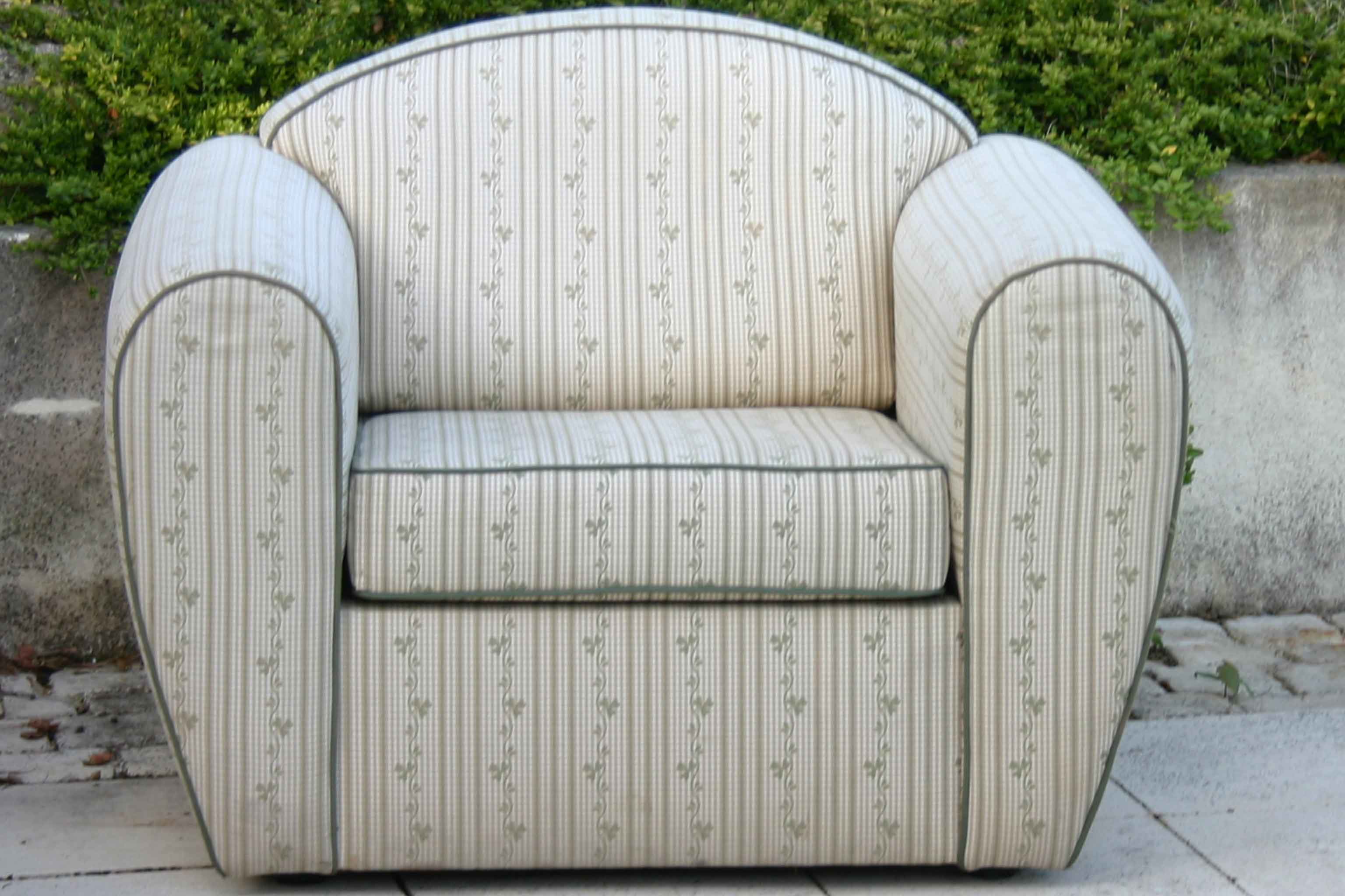 Pair of club chairs covered with fabric