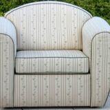 Pair of club chairs covered with fabric