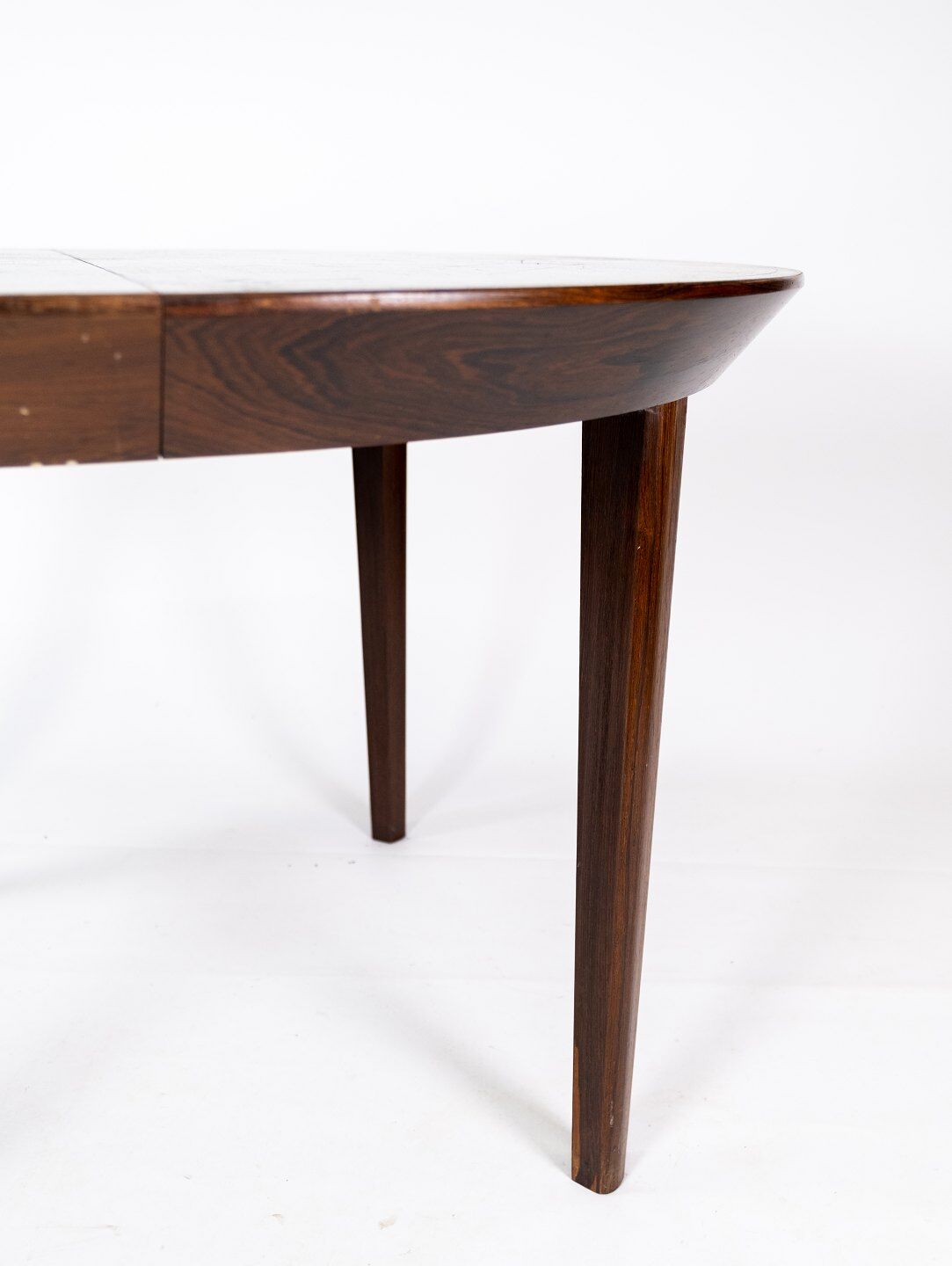 Dining table in rosewood of danish design from the 1960s.