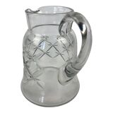 Antique Baccarat water jug in cut crystal with bevels.