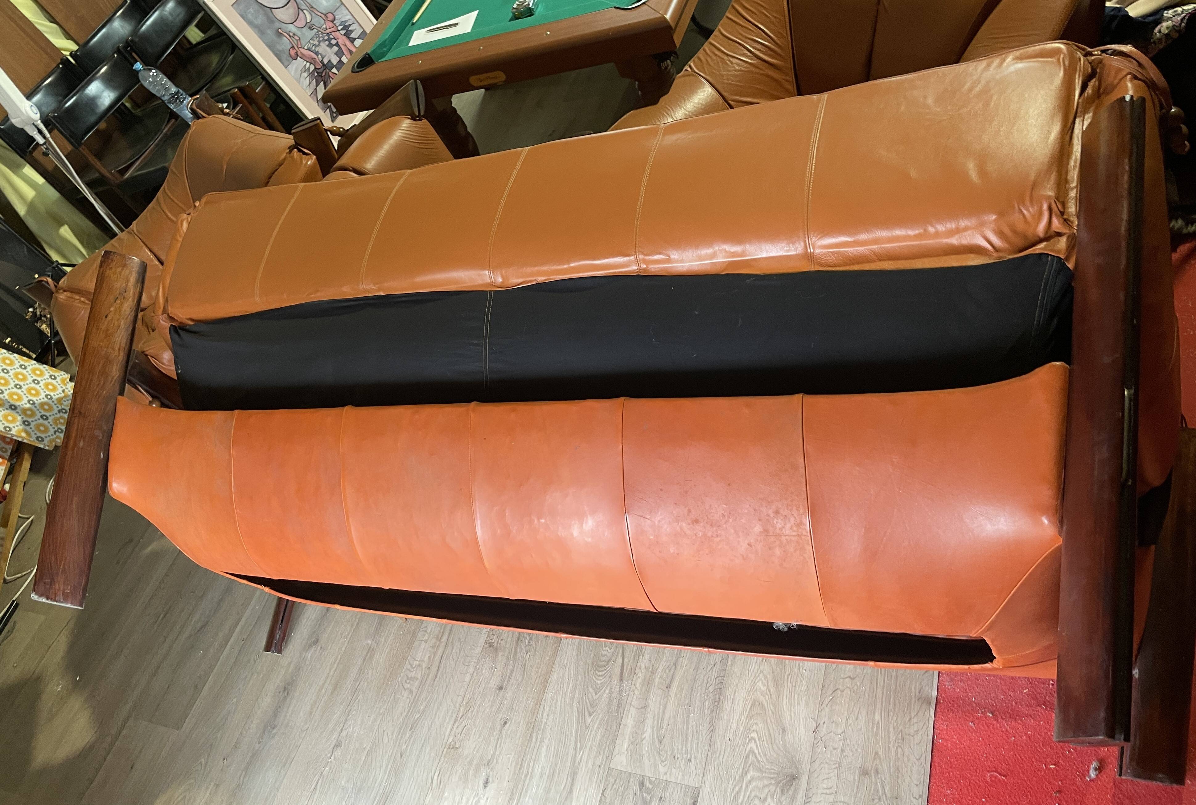 Percival lafer mp-211 sofa set with two armchairs and an ottoman in leather.