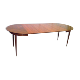 Mahogany round table with 4 extensions from the 1950s