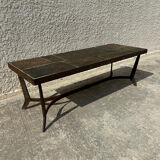 Coffee table with stone top and iron legs