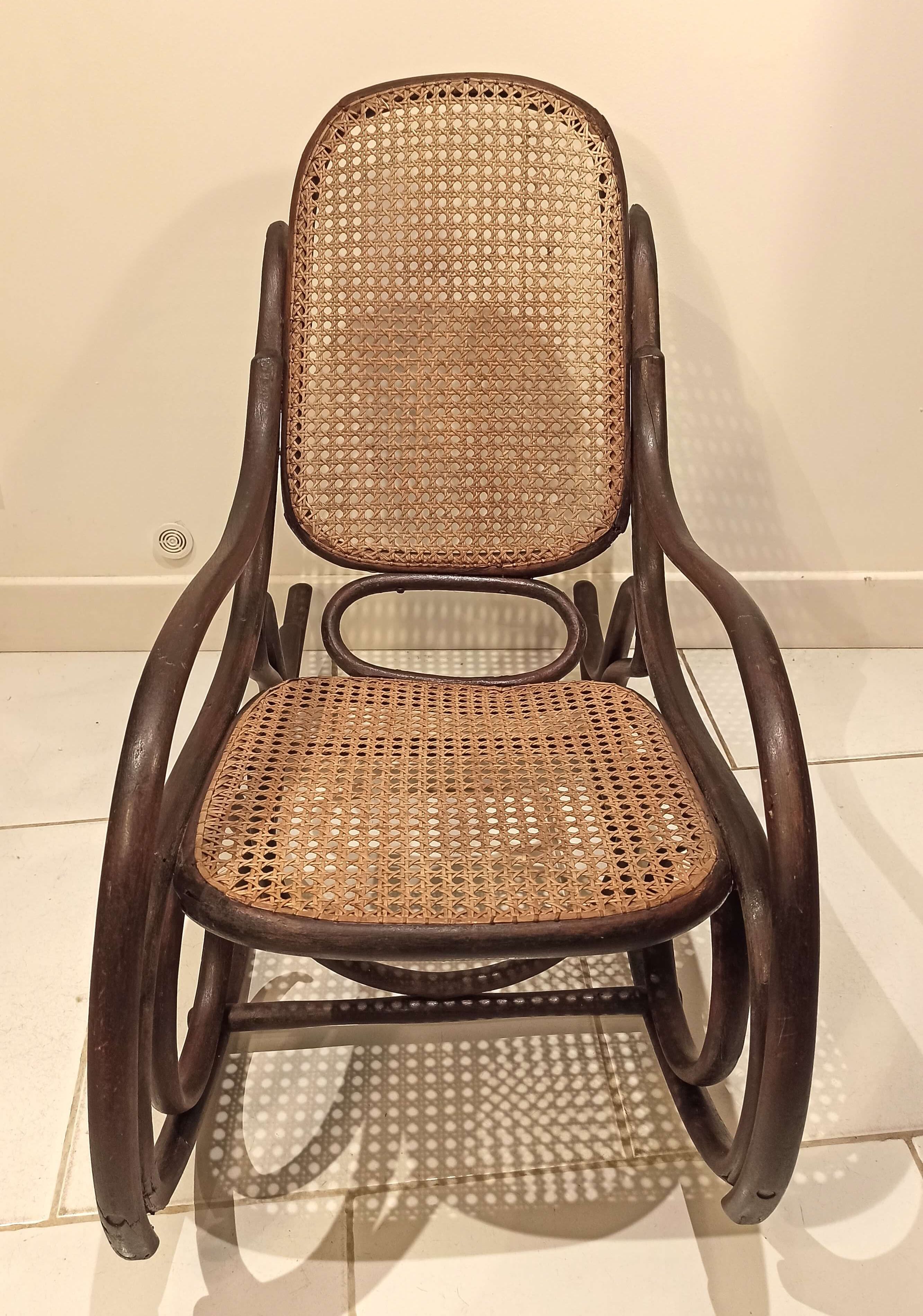 Vintage rocking chair for children in dark rattan and canework, rocking chair