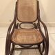 Vintage rocking chair for children in dark rattan and canework, rocking chair