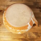 The stoneware pitcher