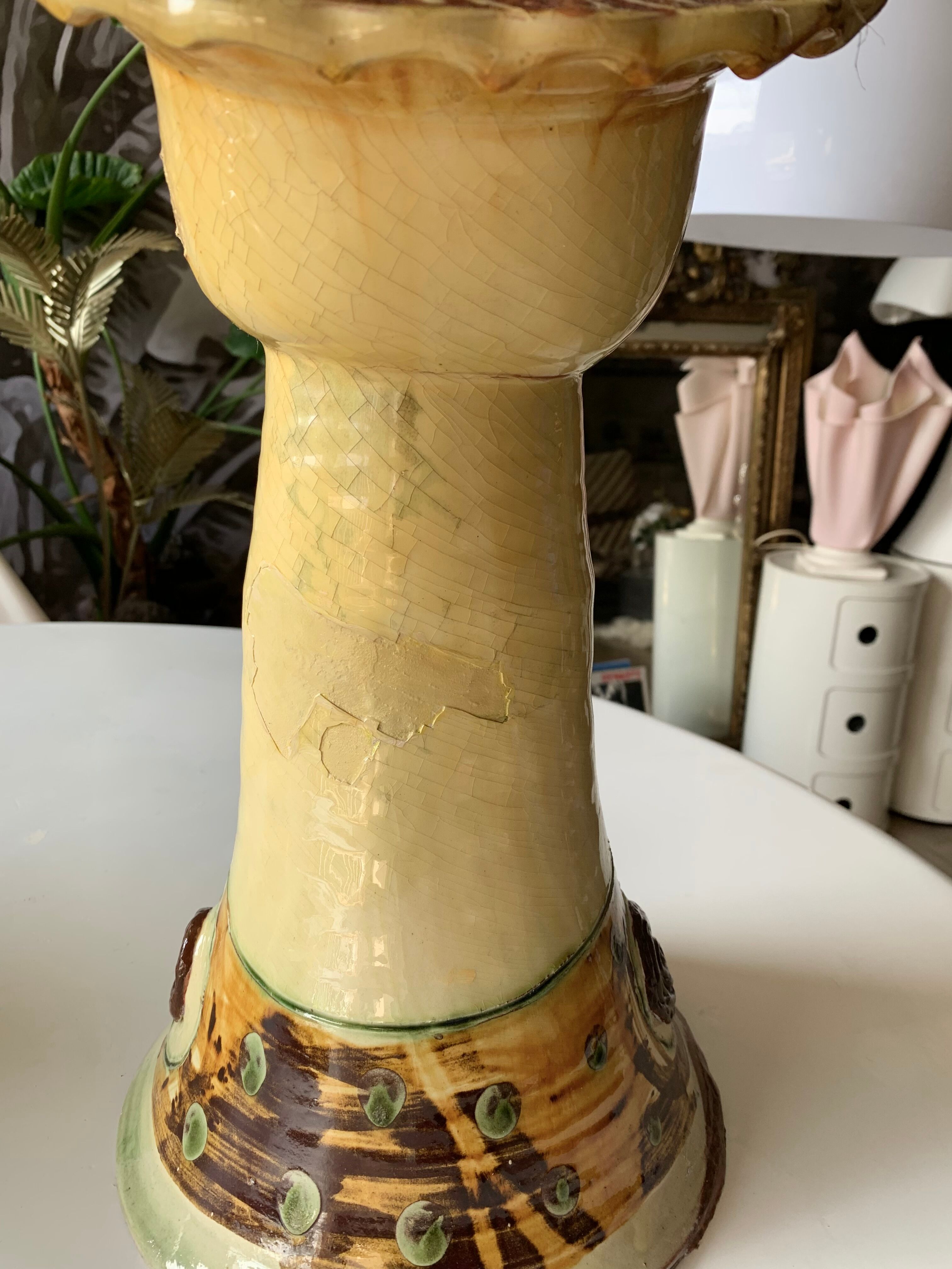 Terracotta plant holder head shape
