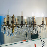 Pair of gilt bronze wall sconces with pendants from the mid-20th century.