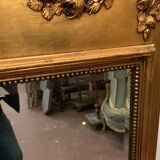 Miroir de style Louis XVI en bois et stuc doré XX siècle