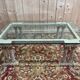 Coffee table with Corinthian columns and glass top