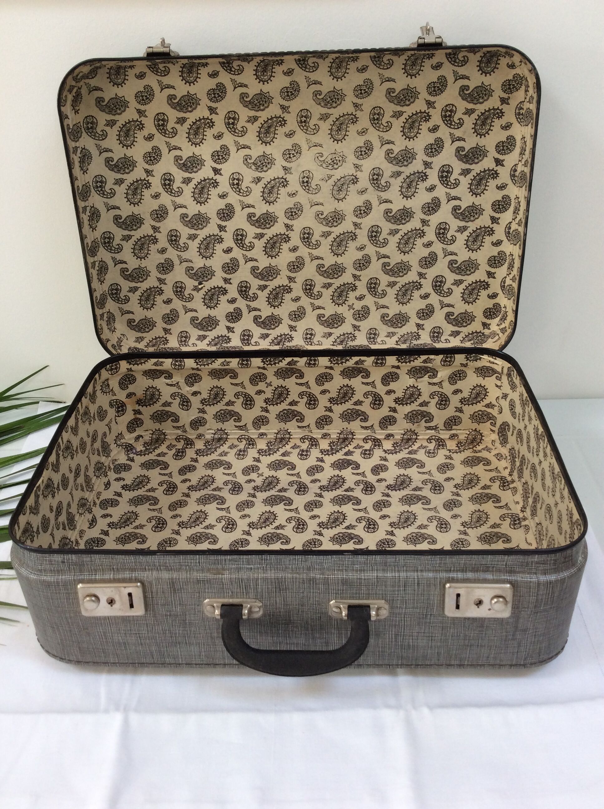 Old gray cardboard suitcase