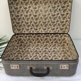 Old gray cardboard suitcase