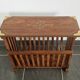 Rosewood and brass magazine stand table