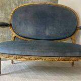 Banquette en bois doré sculpté et mouluré de style Louis XVI Époque XIX eme siècle