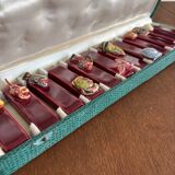 Set of vintage red ceramic knife holders, marine motif, retro style