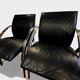Set of 6 black leather armchairs — Gisberger — Circa 1980