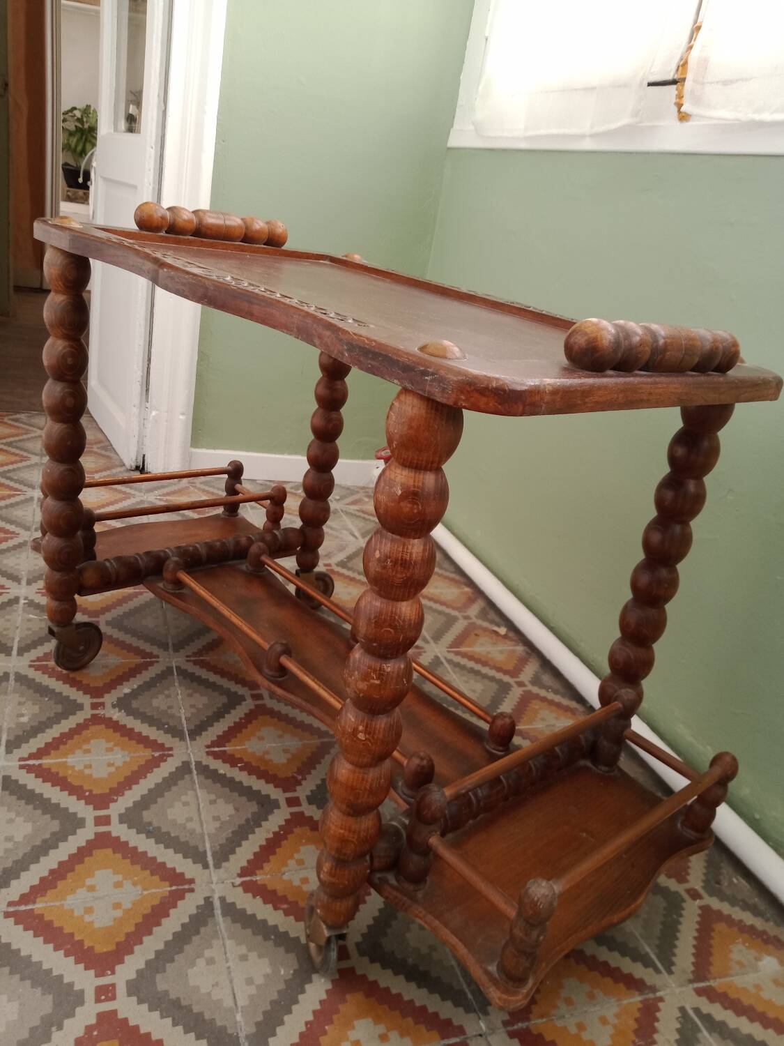 Wooden trolley on wheels