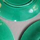 Three green slip plates
