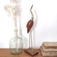 Large wooden and brass heron