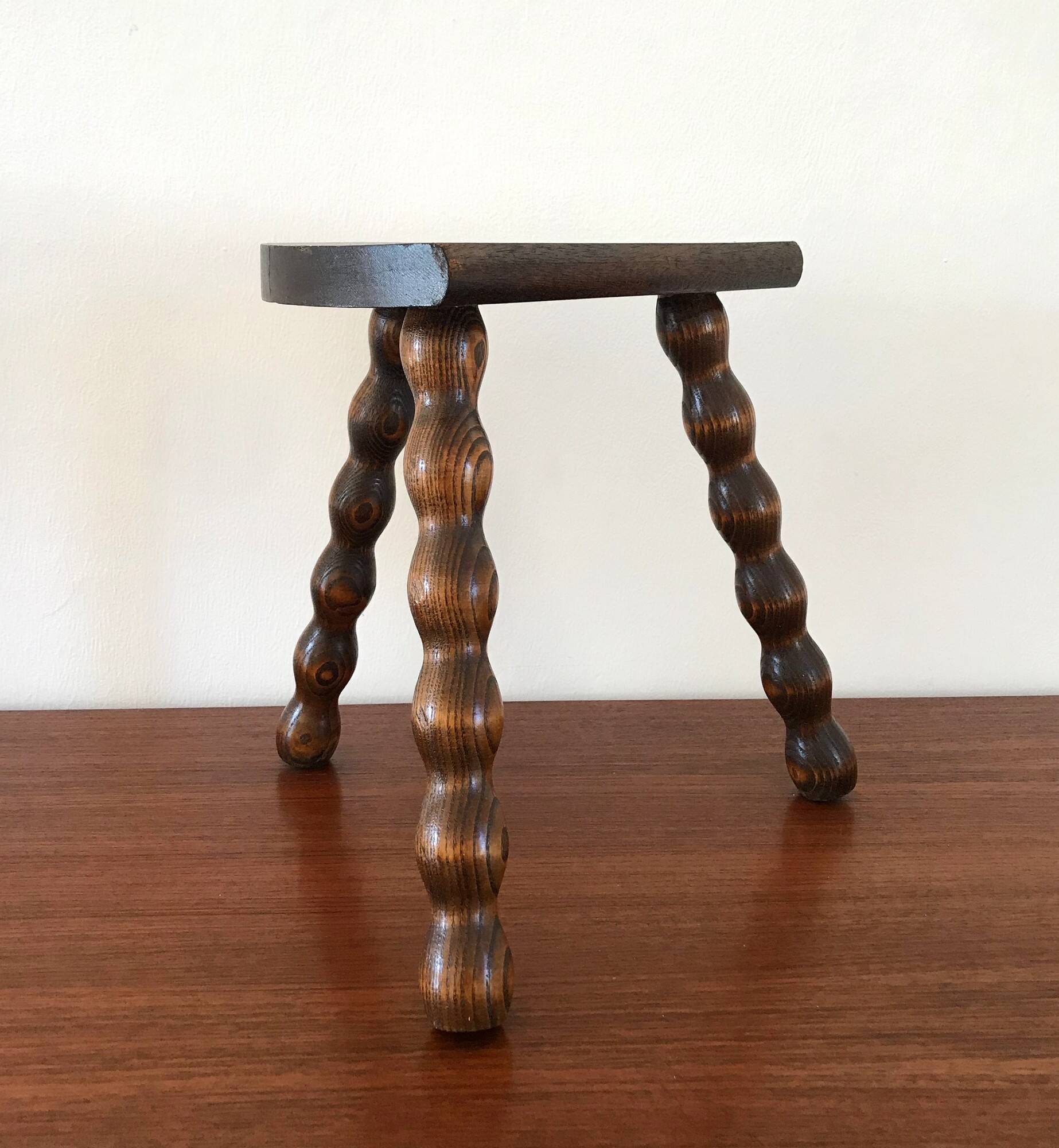 Vintage solid wood tripod stool from the 70s