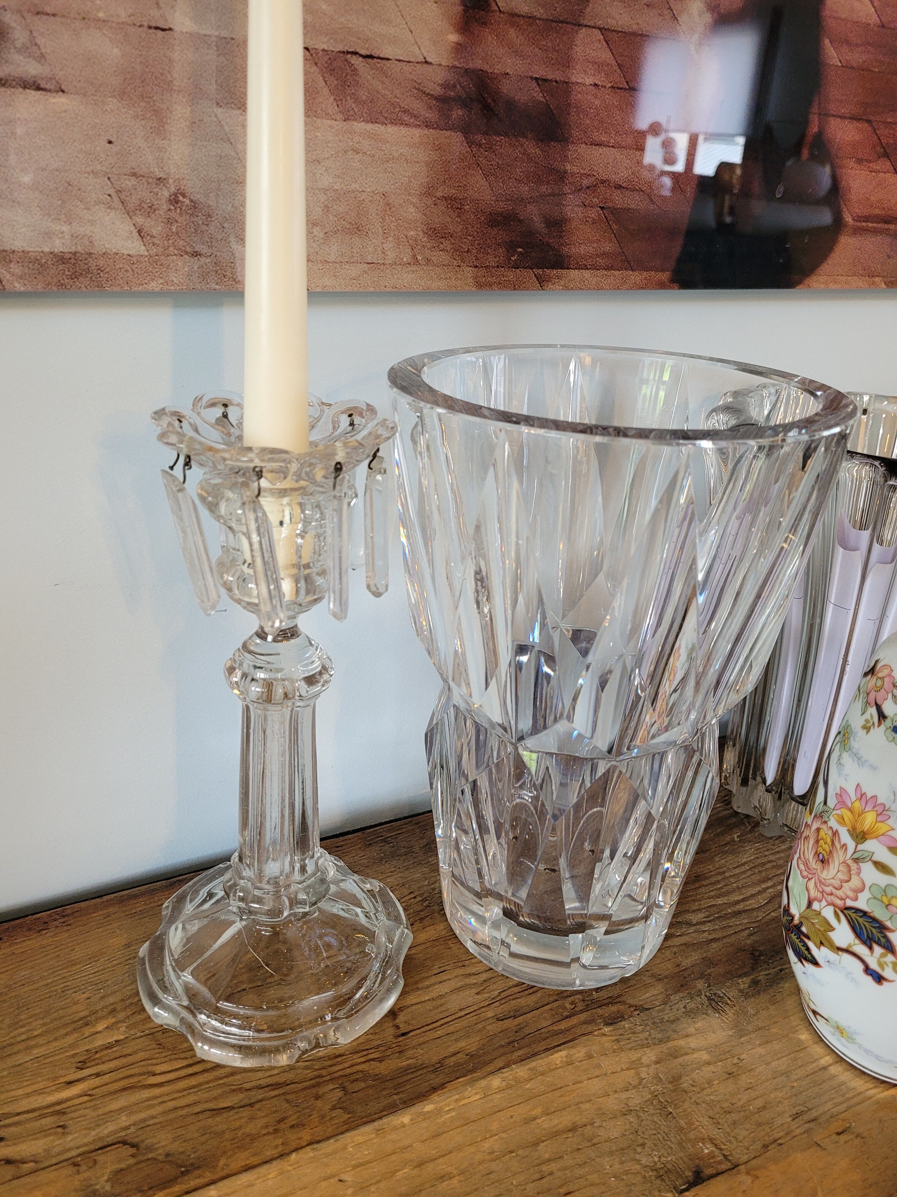 Old candlestick with molded glass stamps