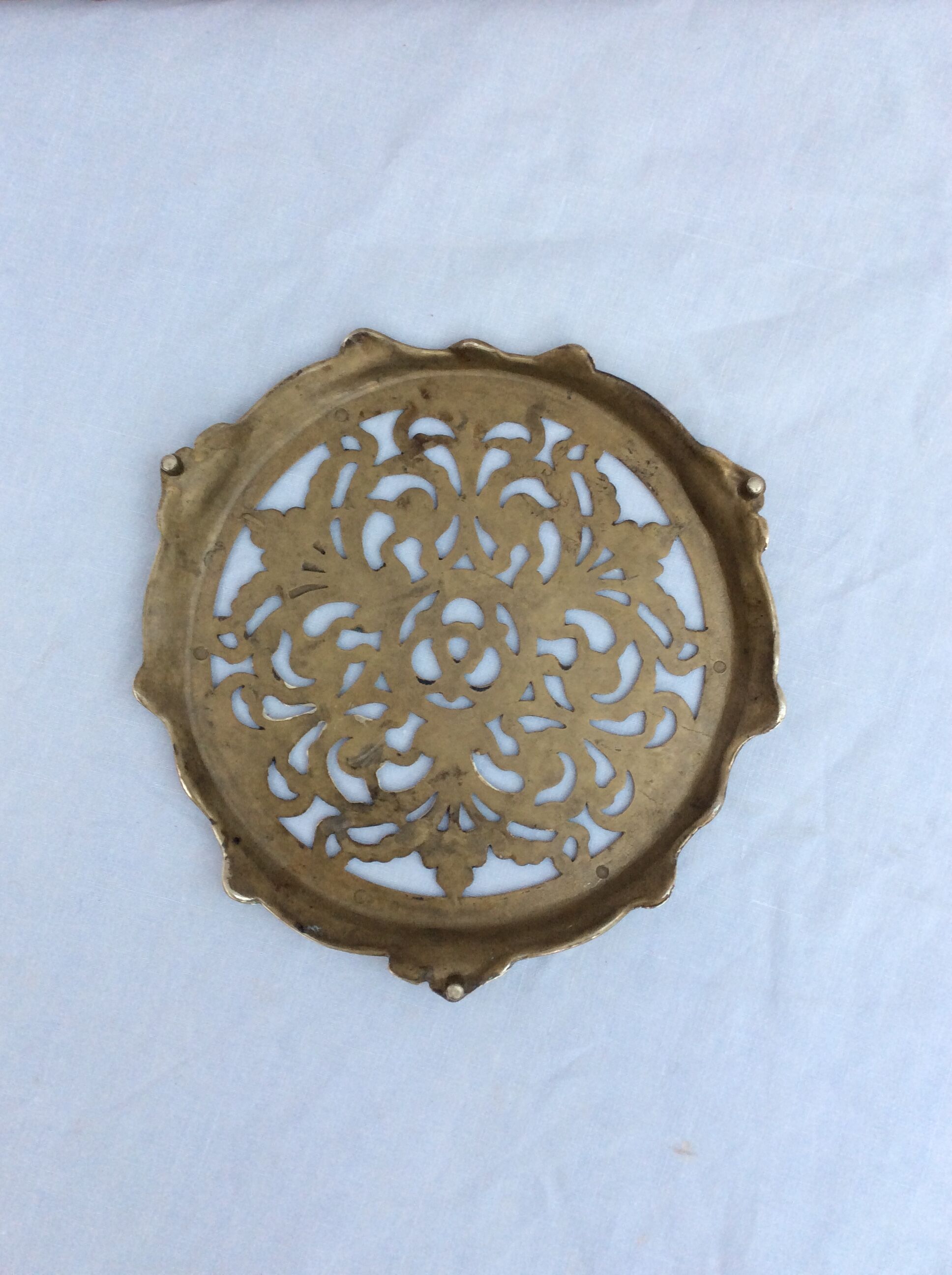 Round flat in vintage brass