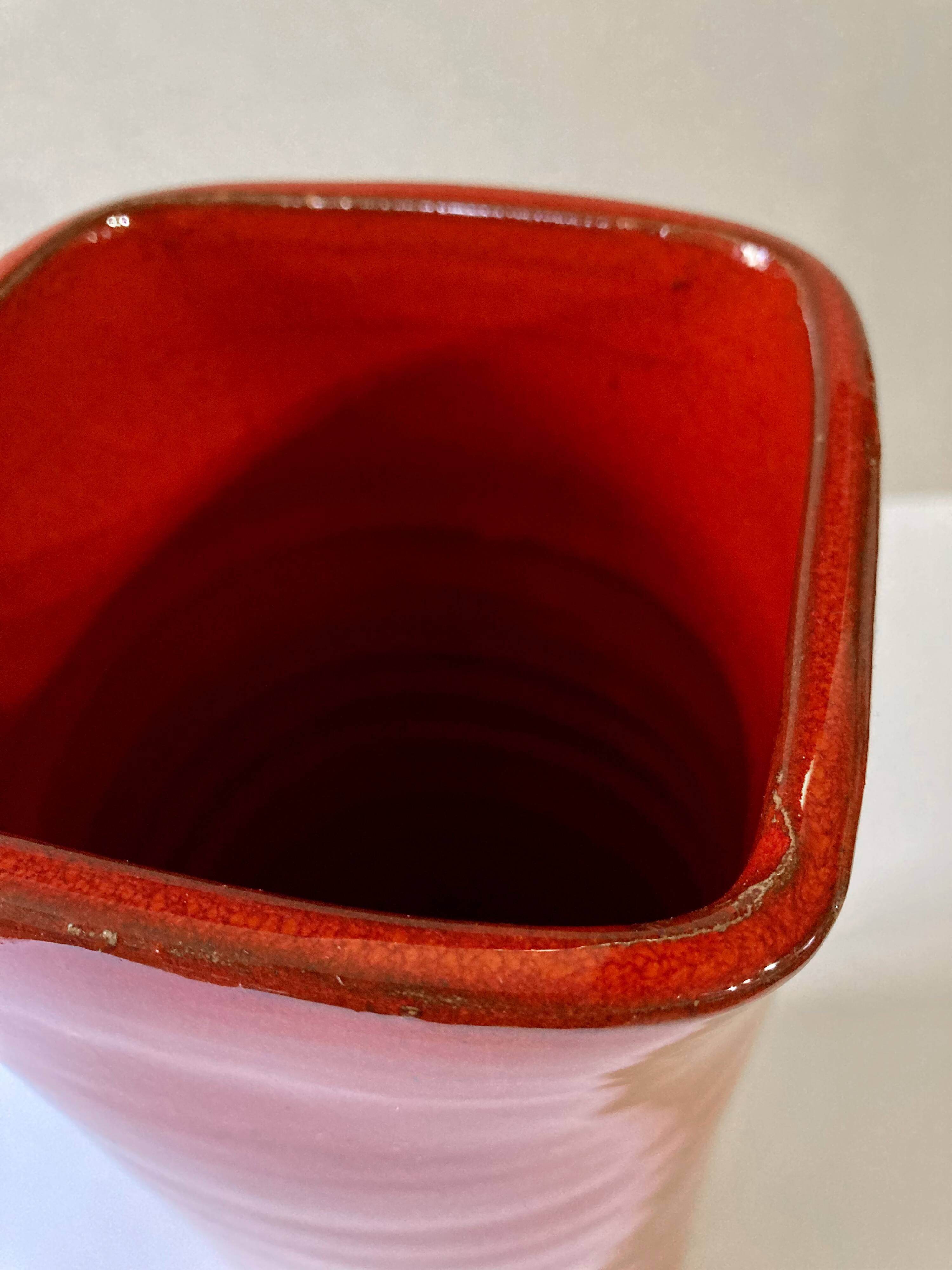 Large red glazed ceramic vase