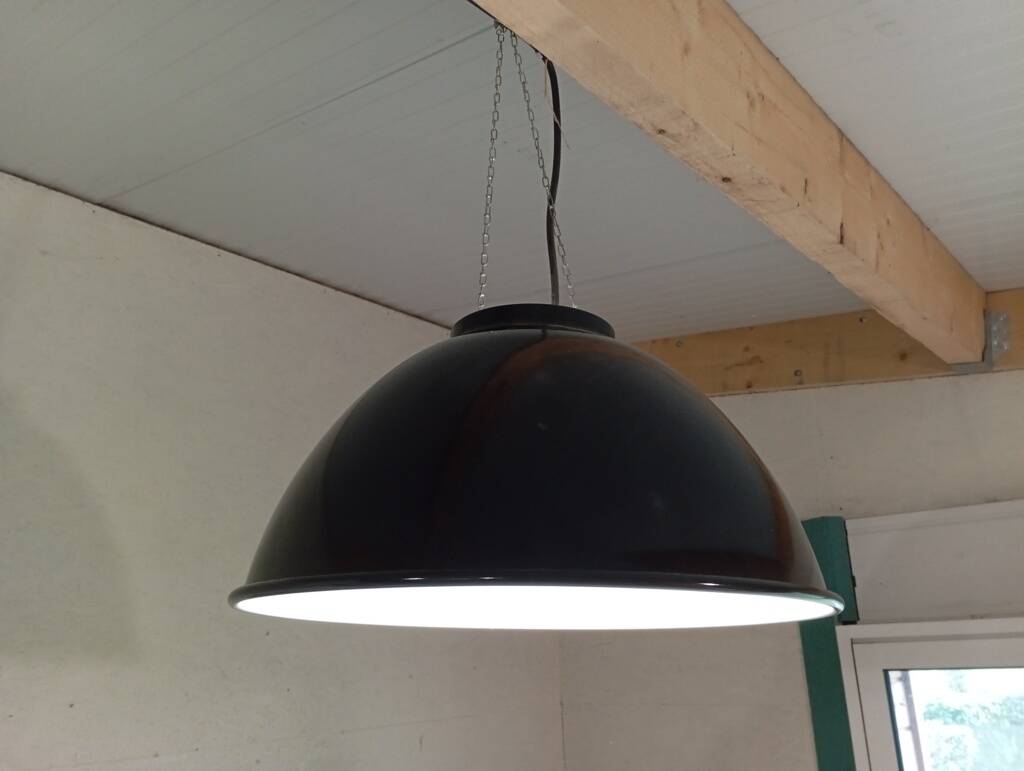 Set of 10 large industrial enamelled metal pendants.