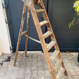 Antique authentic painter's stepladder in vintage patinated wood