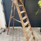 Antique authentic painter's stepladder in vintage patinated wood