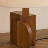 Pair of geometric handcrafted lamps in solid oak circa 1970.